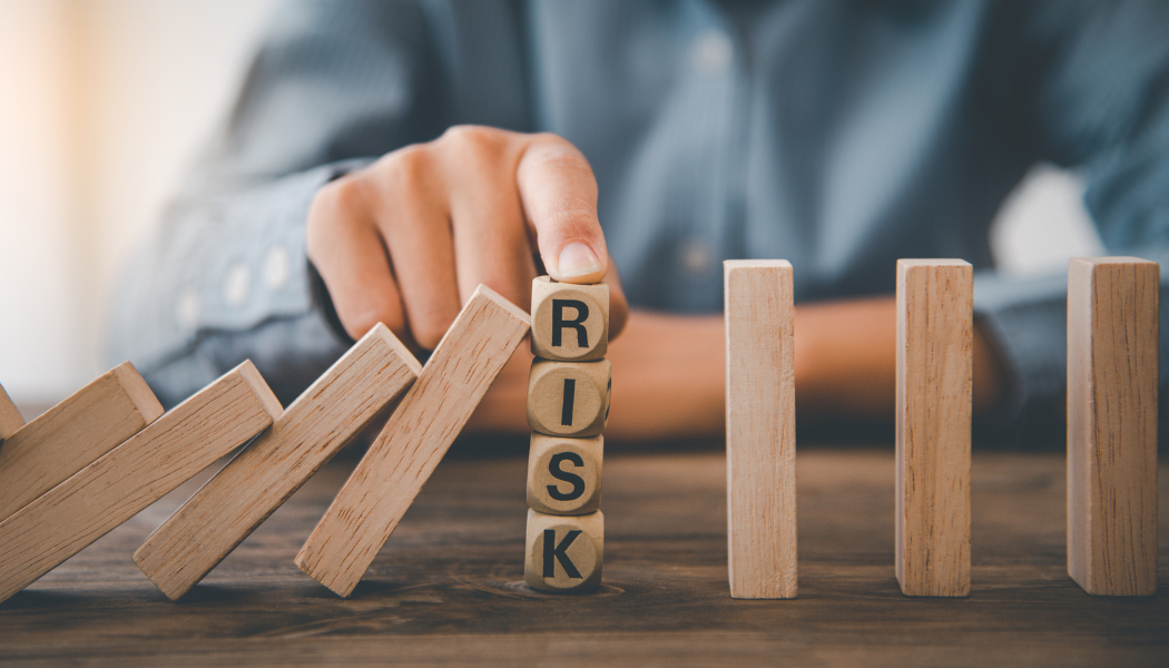 Wooden letters spelling “RISK” illustrating risk factors for developing type 2 diabetes