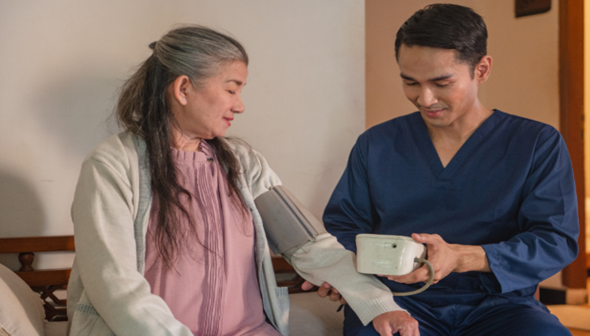 lady having her blood pressure taken