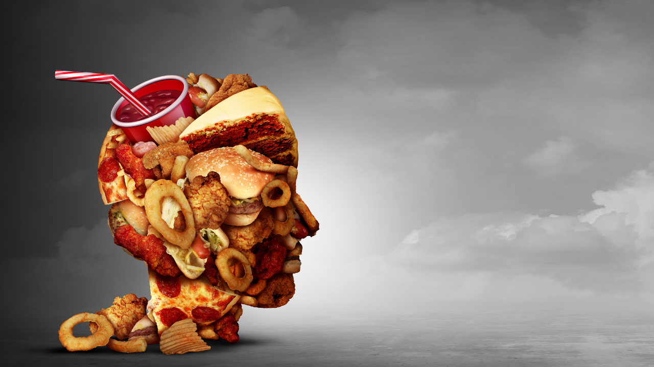 Head shaped from unhealthy fast food representing emotional eating and its impact on type 2 diabetes