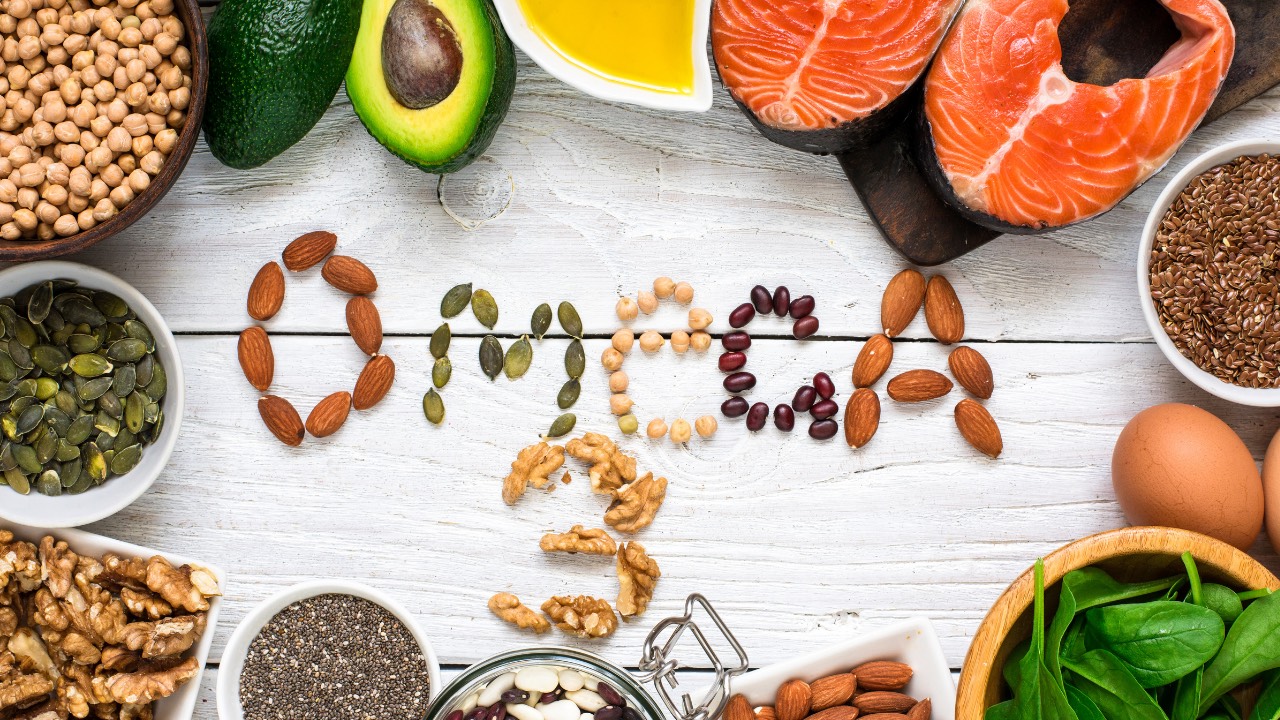 Healthy foods with seeds and nuts spelling out “Omega 3” to illustrate anti-inflammatory fats for type 2 diabetes