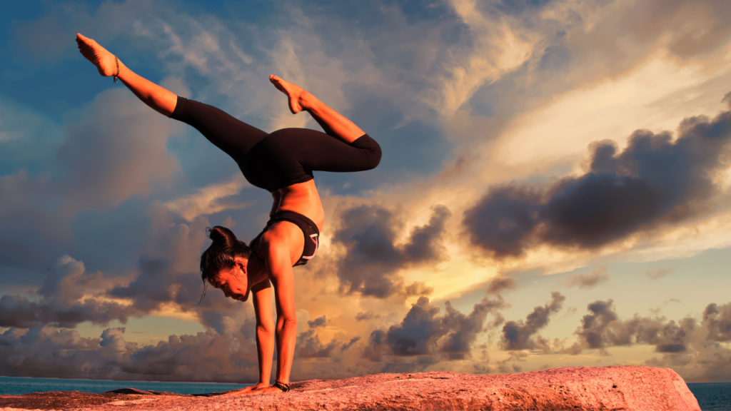 Woman doing yoga pose outdoors, supporting wellness and reversing type 2 diabetes naturally