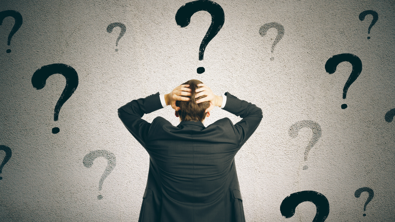 Person holding head with question marks around them, illustrating confusion over diet advice for type 2 diabetes