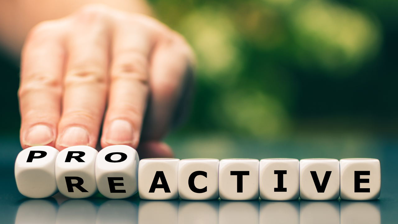 Dice spelling the words “proactive” and “reactive,” symbolising the importance of taking control in reversing type 2 diabetes