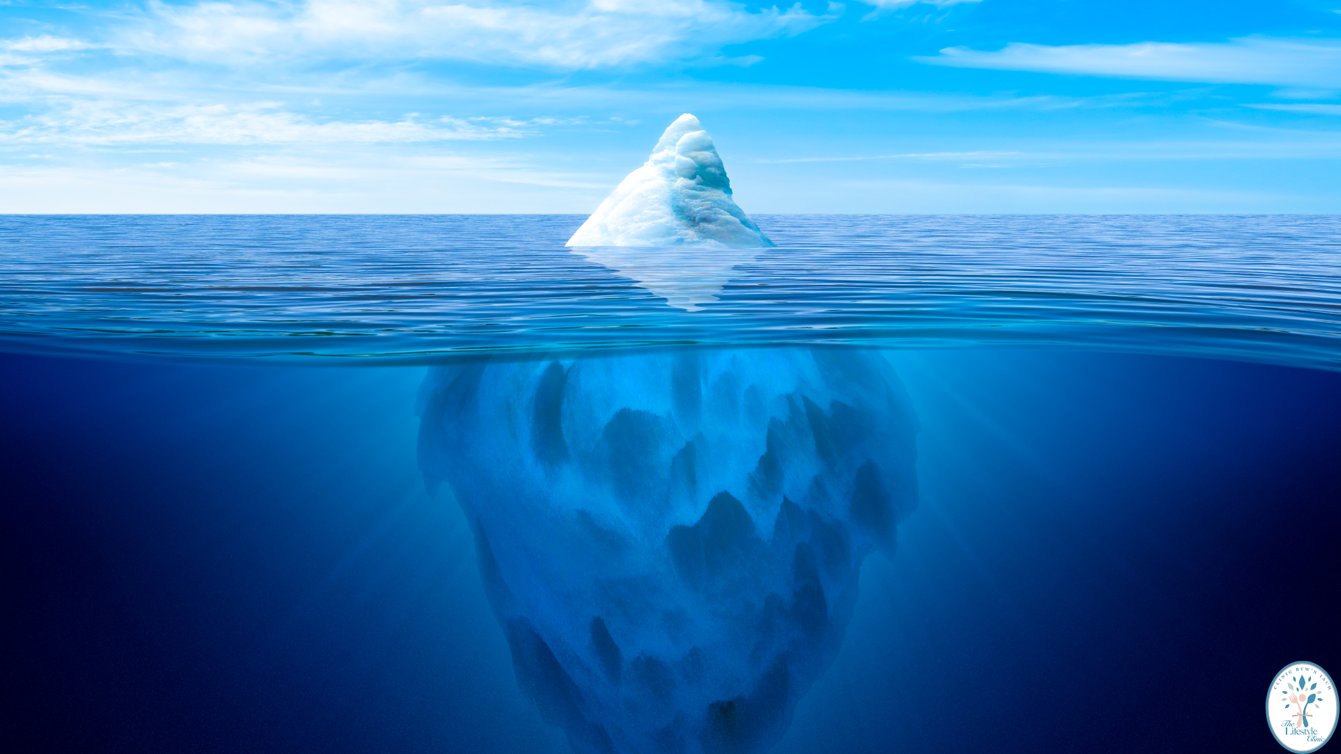 Iceberg representing that changing food intake is only the tip of the iceberg for sustainable weight loss