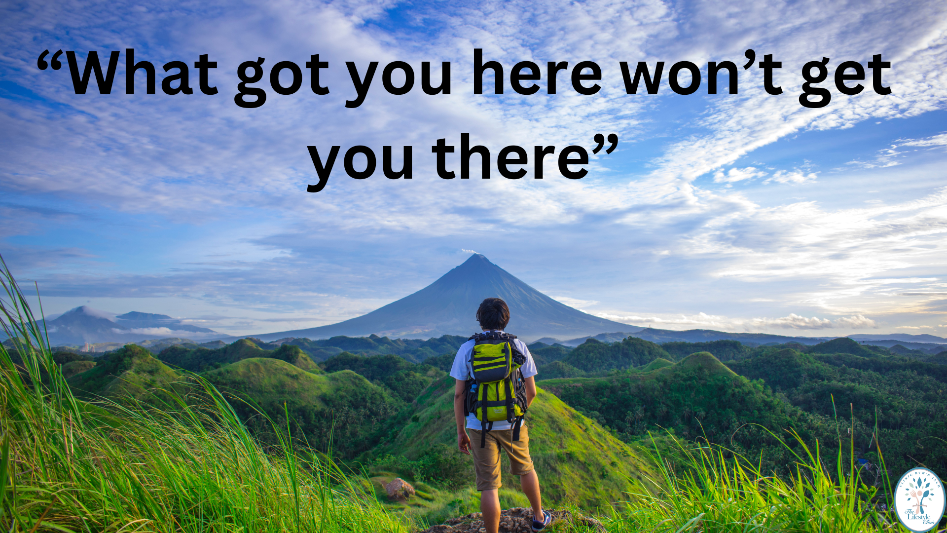 Person looking ahead at a landscape with quote "What got you here won’t get you there"